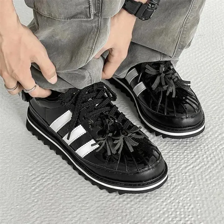 Adidas Black Patent Leather Sneakers with Three-Stripe Detail