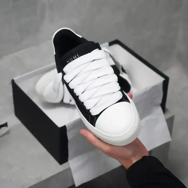 NUMERIS Black and White Lace-Up Low-Top Flats