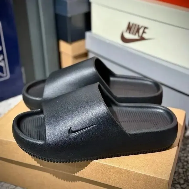Nike Black Slide Sandals with Embossed Swoosh