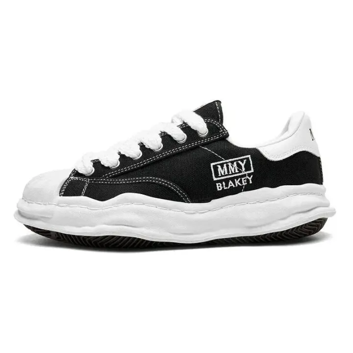 Alexander McQueen Canvas Low-Top Sneakers in Black and White