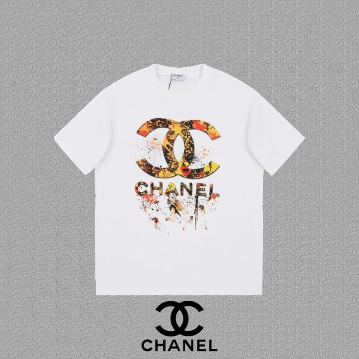 Biały T-shirt Chanel z grafiką CC w stylu zachlapania farbą