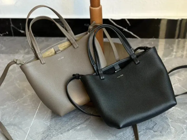 The Row Pebbled Leather Crossbody Tote in Black and Taupe