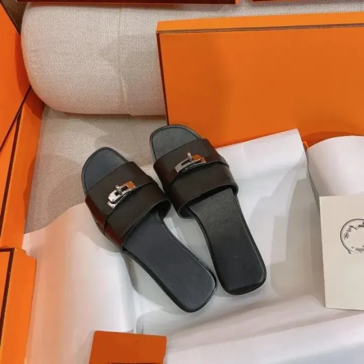 Hermès Buckle Slide Sandals in Black and White