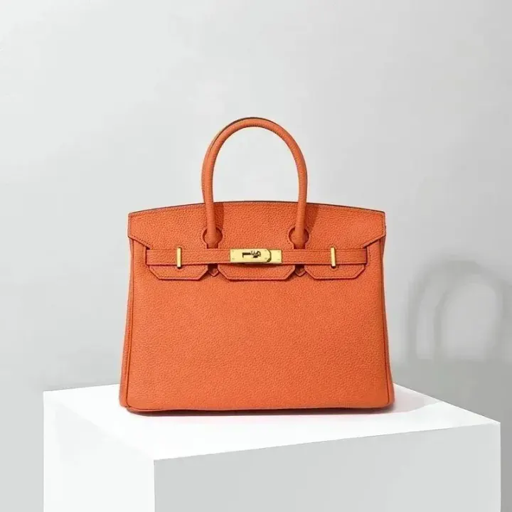 Hermès Structured Leather Crossbody Bag in Orange