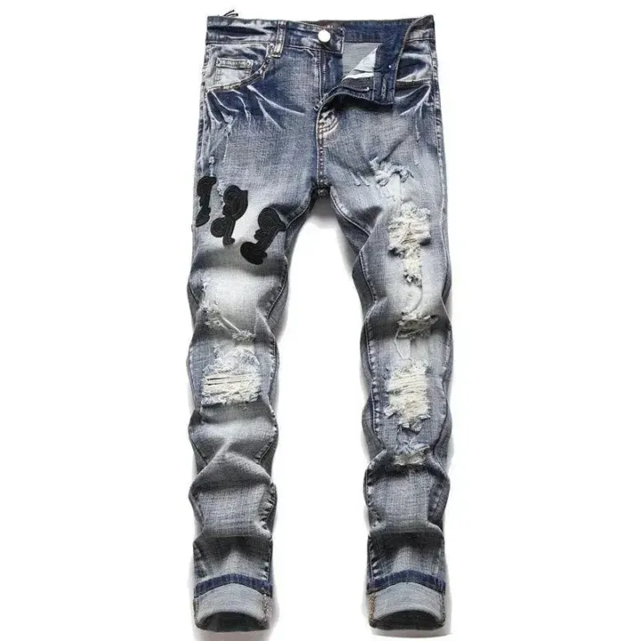 Gucci Distressed Blue Denim Pants with Graphic Leg Detail