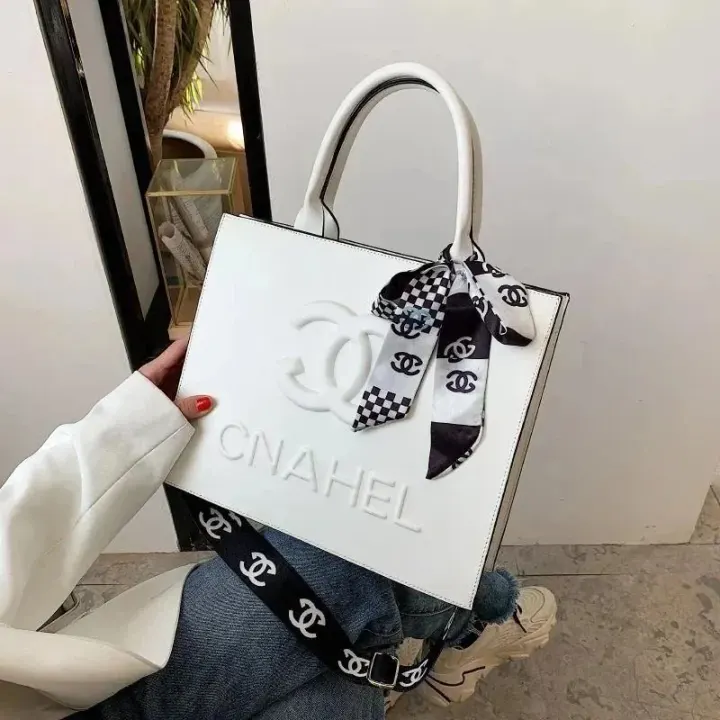 Chanel Embossed Logo Crossbody Tote Bag in White