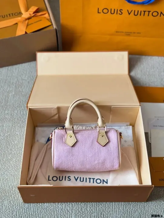 Roze kleine Louis Vuitton handtas met bovenhandvat