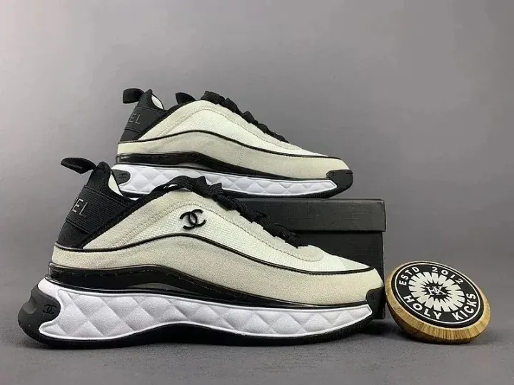 Chanel Two-Tone Low Top Sneakers in Black and Cream