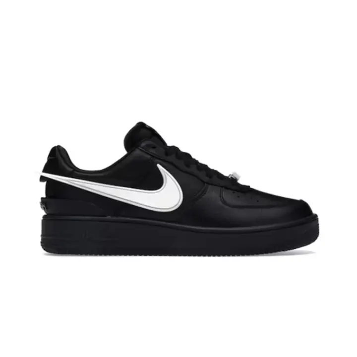 Nike Black Low-Top Sneakers with Oversized White Swoosh