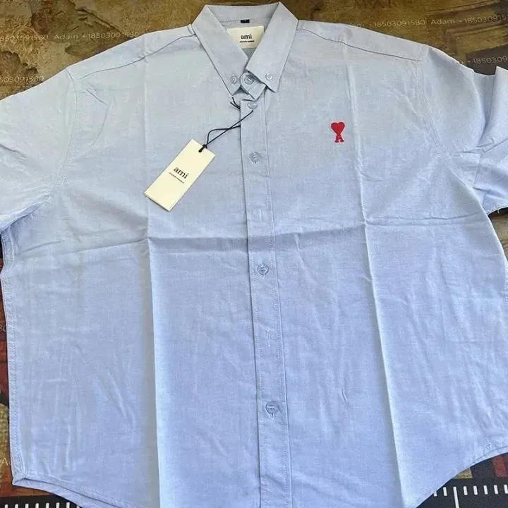 Ami Light Blue Button-Up Shirt with Heart Logo