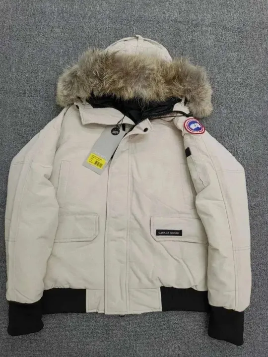 Canada Goose kremowa kurtka puchowa z kapturem i futrzanym obszyciem