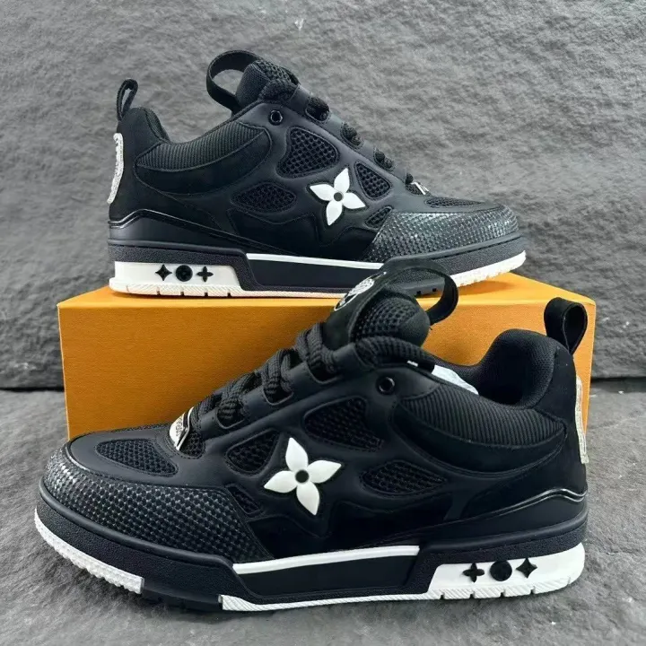 Louis Vuitton zwarte sneakers van mesh en leer met trainer-design