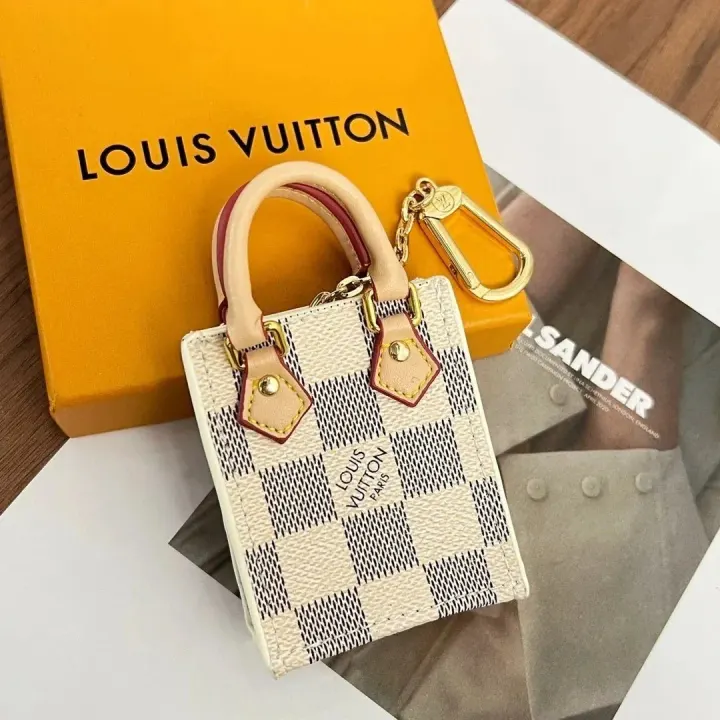 Charm para bolso Louis Vuitton Mini Damier en beige