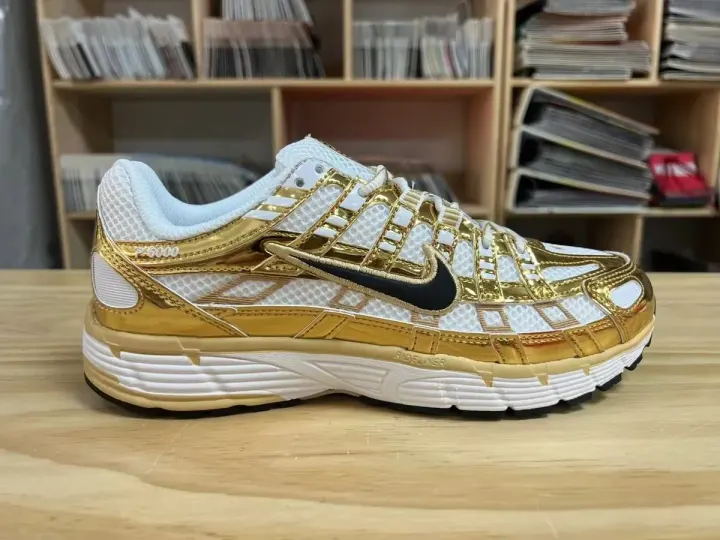 Nike P-6000 Sneakers in Metallic Gold and White