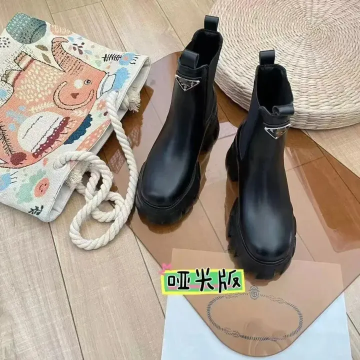 Prada Black Platform Ankle Boots with Triangle Logo Plaques