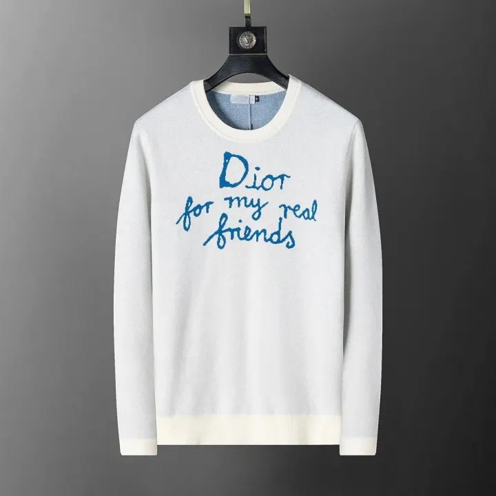 Witte gebreide trui van Dior met blauw geborduurde tekst