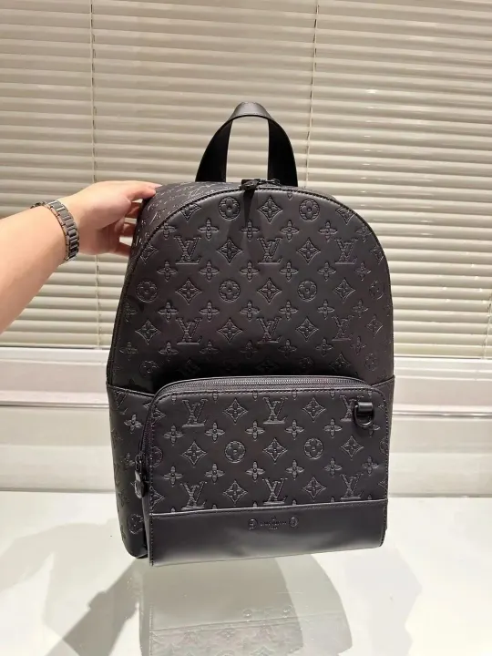 Louis Vuitton Black Monogram-Embossed Leather Backpack