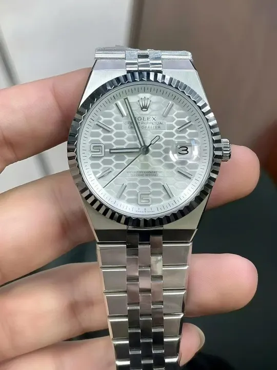 Rolex Watch with Silver Honeycomb Dial and Fluted Bezel