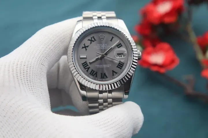 Rolex Watch with Fluted Bezel and Roman Numeral Dial