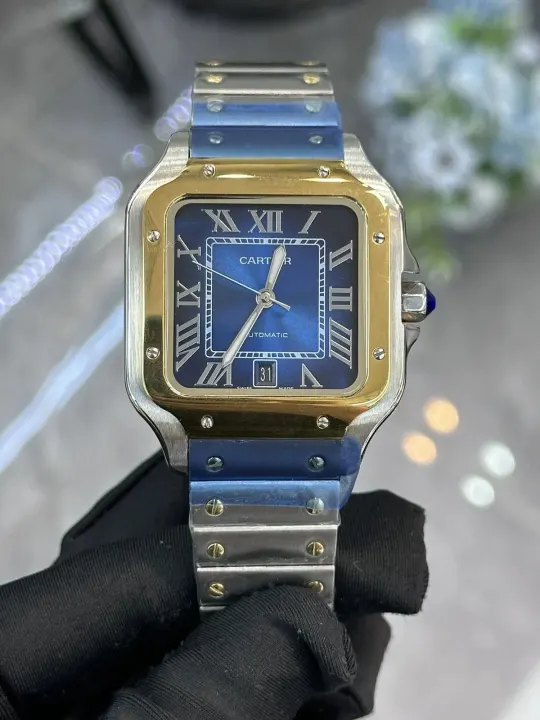 Cartier automatisch horloge met blauwe wijzerplaat en bicolor schakelband