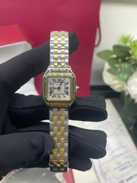 Cartier bicolor horloge met Romeinse cijfers op de wijzerplaat